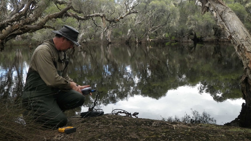 Mark Lund taking samples