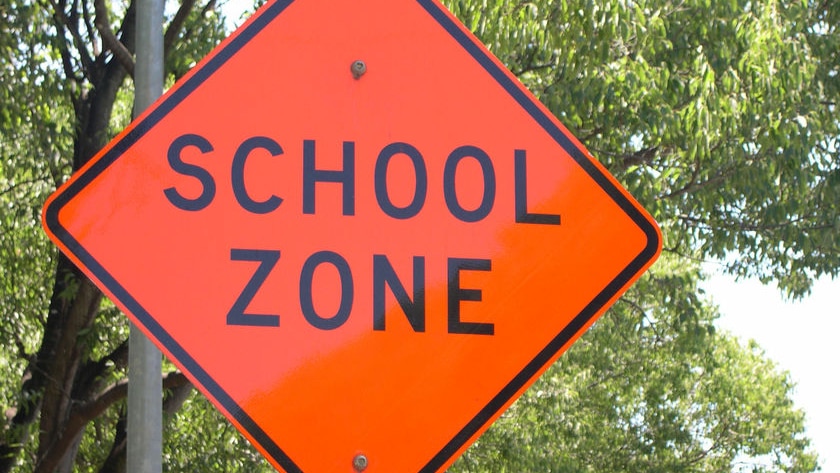 Sign saying 'School Zone' outside Canberra school - generic - indicating a 40 road speed limit
