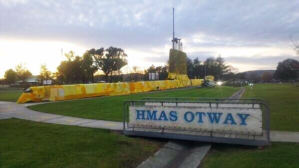 A yarn bombing project in Holbrook has transformed the HMAS Otway into a yellow submarine.