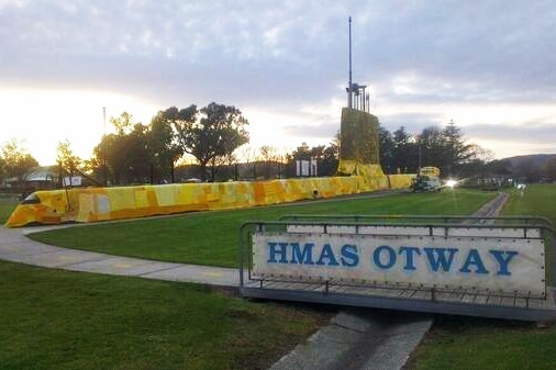 A yarn bombing project in Holbrook has transformed the HMAS Otway into a yellow submarine.