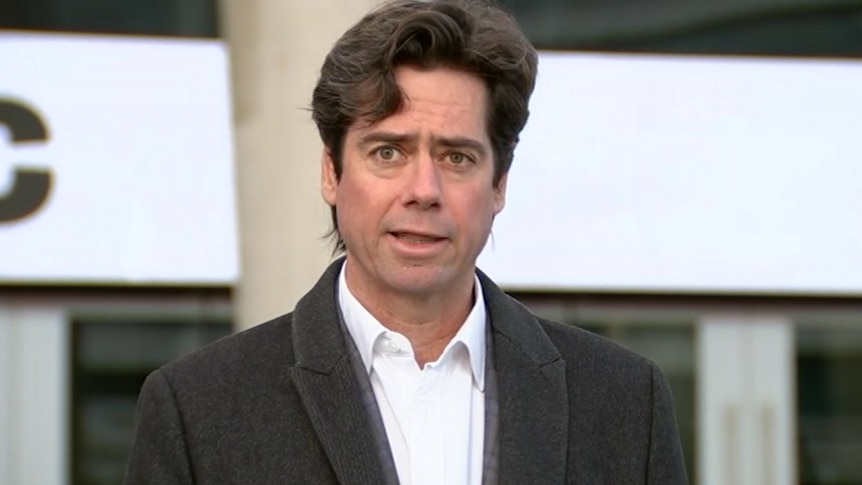 Gillon McLachlan speaks at a press conferences