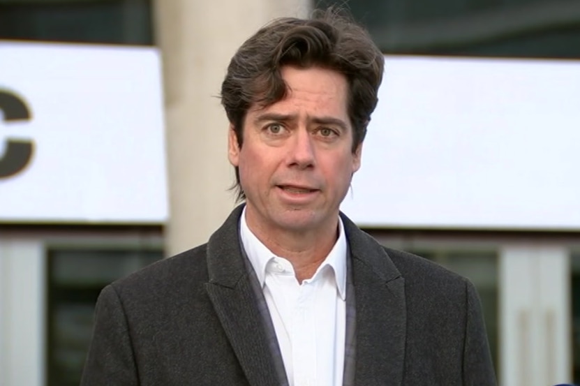 Gillon McLachlan speaks at a press conferences