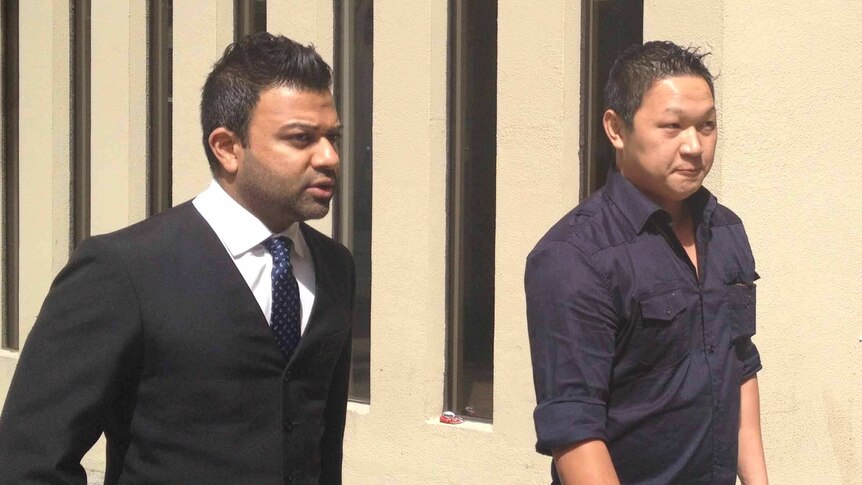 Tung Tran  with his lawyer Shash Nigam.