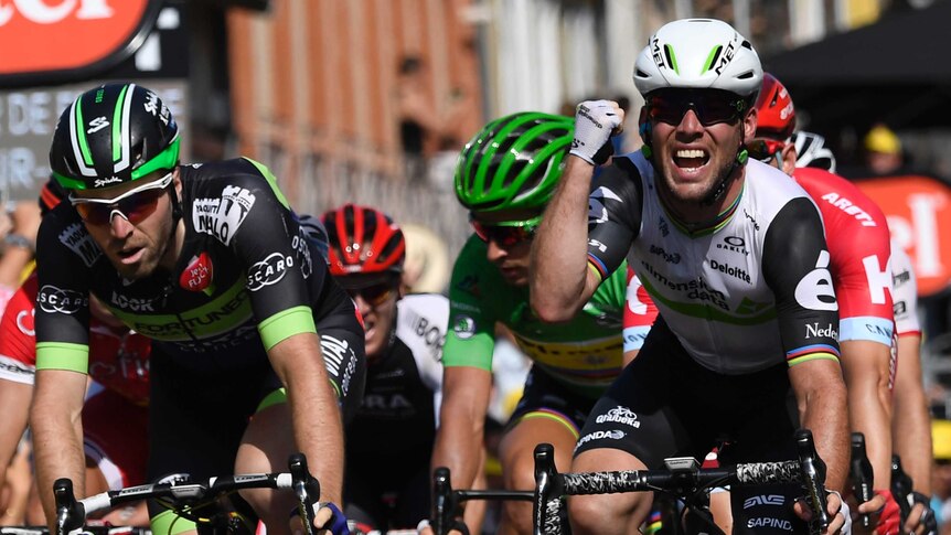 Mark Cavendish celebrates winning Tour de France sixth stage