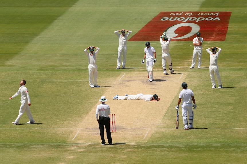 Australian fielders surround Faf du Plessis at Adelaide Oval