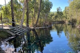 steps leading into a natural thermal pool