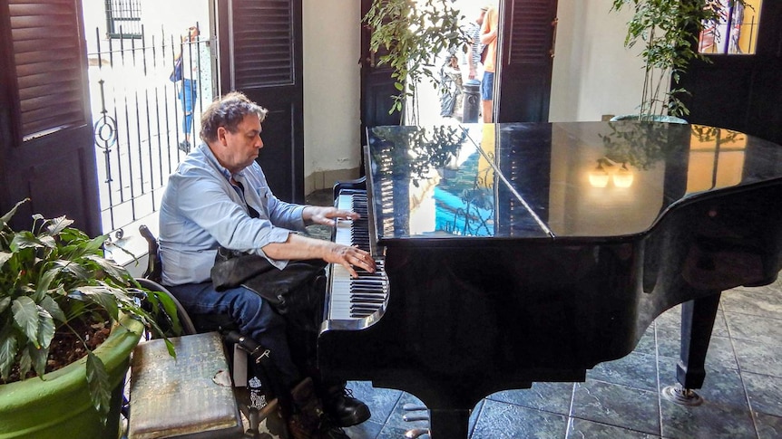 Author Ken Haley plays piano in Cuba's Hotel Ambos Mundo. Ernest Hemingway's summer retreat in the 1940s.