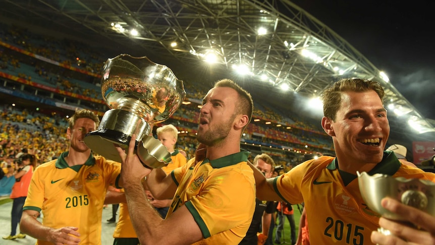 Socceroos celebrate their win over Sth Korea in the Asian Cup final
