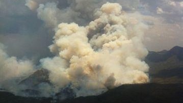 A bushfire burns about 20 kilometres north of Coonabarabran in north-west New South Wales, January 13, 2012.