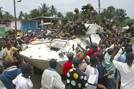 Locals cheer peacekeepers