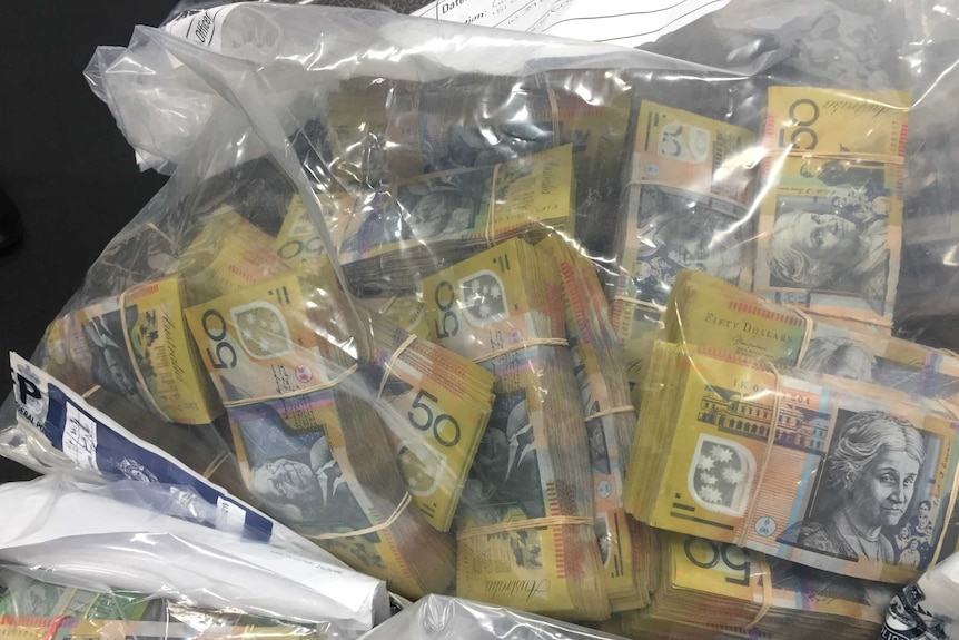 Cash seized by the AFP over a $165-million fraud syndicate.