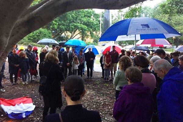 A crowd gathers in Newcastle's Civic Park for a vigil in the wake of the Paris terror attacks.