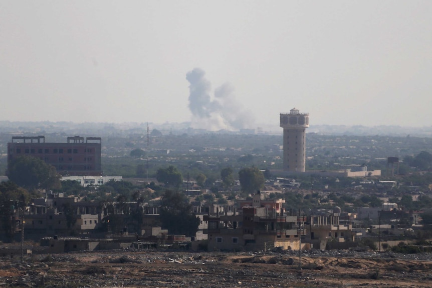 Smoke rises in Egypt's North Sinai