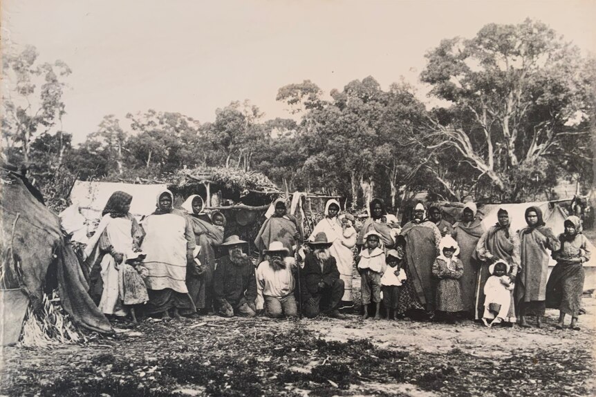 A black and white photograph of an Aboriginal mob.