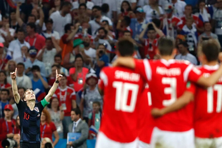 Luka Modric celebrates penalty against Russia