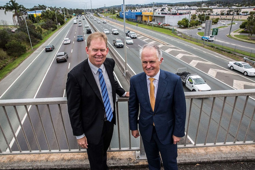 Mr Turnbull and the Member for Forde Bert van Manen overlook the M1 in 2015.