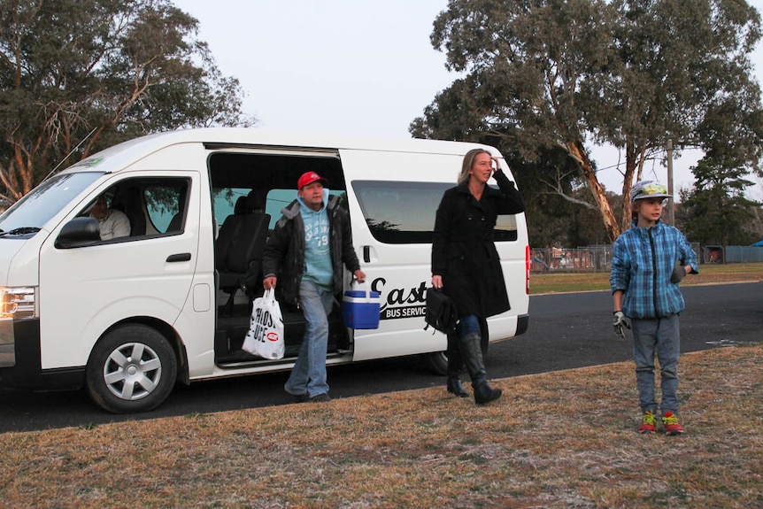 Damien Cheesewright and family exit Gulgong Nightrider Community Bus
