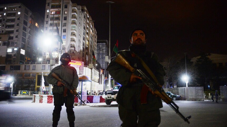 Guards in front of Serena Hotel on March 21, 2014