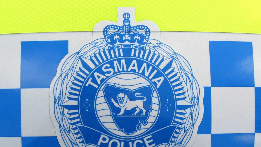 Tasmania Police hat showing a badge.
