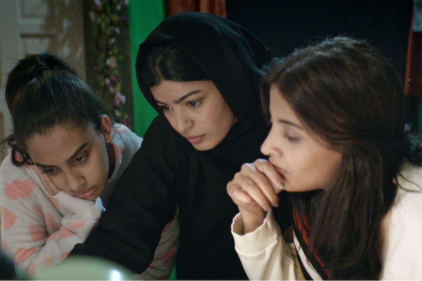Film still of Nora Al Awadh as Sara, Mila Al Zahrani as Maryam and Dae Al-Hilali as Selma in The Perfect Candidate