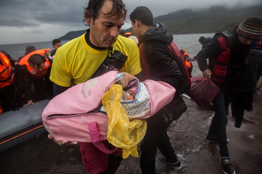 A man rescues a baby.