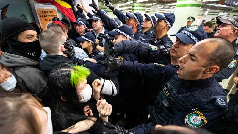 Police clashing with protestors inside Central Station after the rally on Saturday.