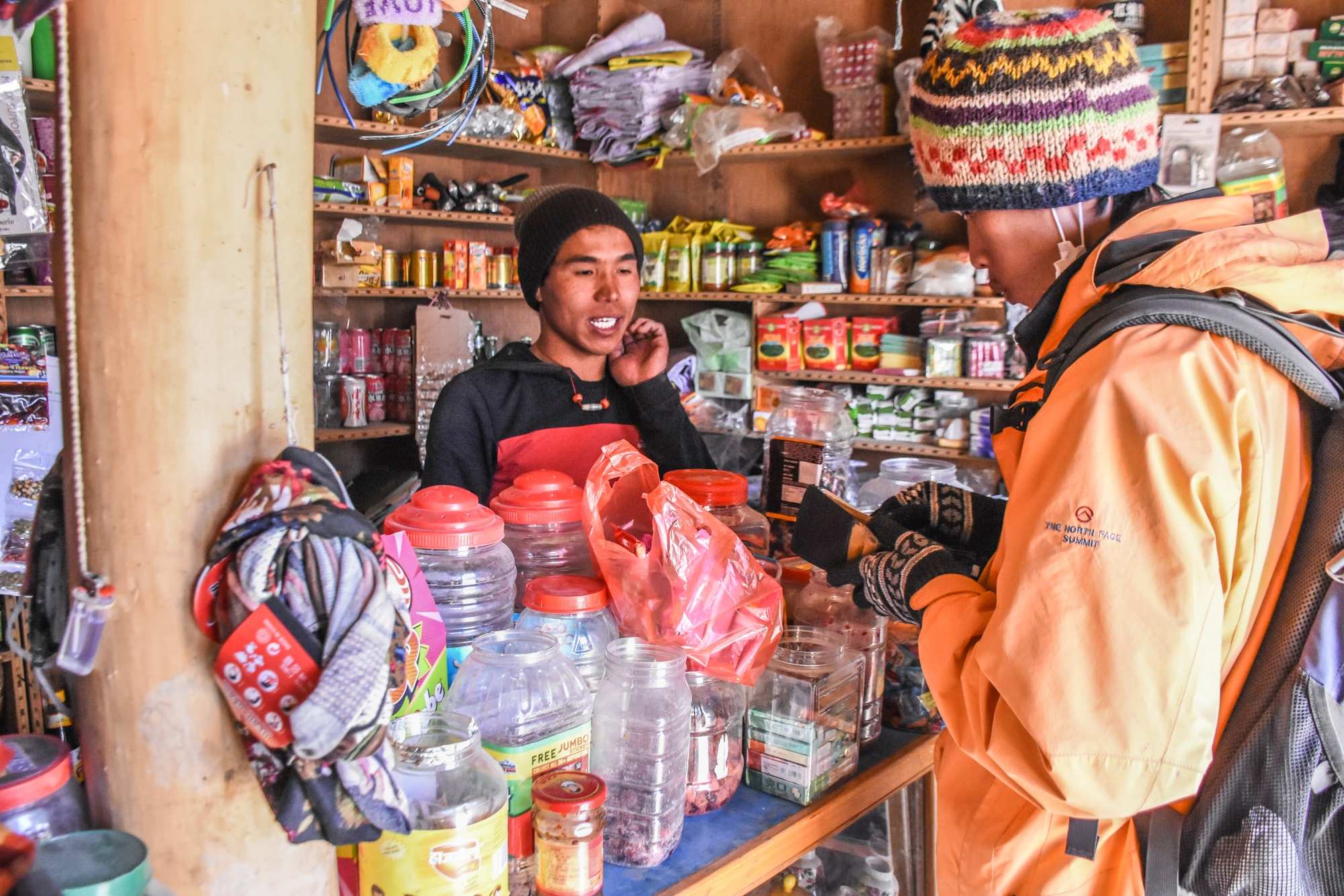 A shop lined with colourful packaged goods