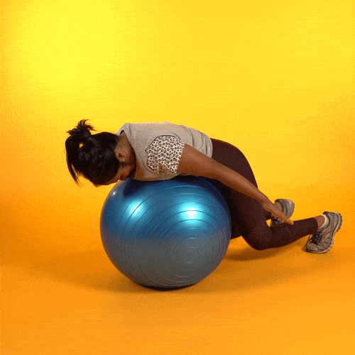 How to use an exercise ball at home to build core strength and stability -  ABC Everyday
