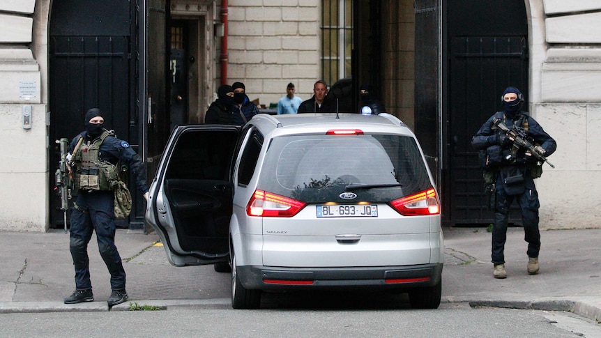 French police escort a convoy transporting Salah Abdeslam.