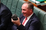 Barnaby Joyce holds a lump of coal in the House of Representatives