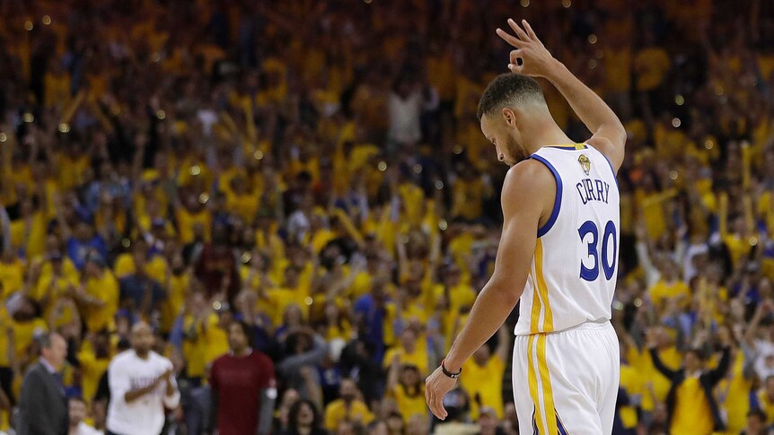 Steph Curry reacts to the crowd during NBA Finals