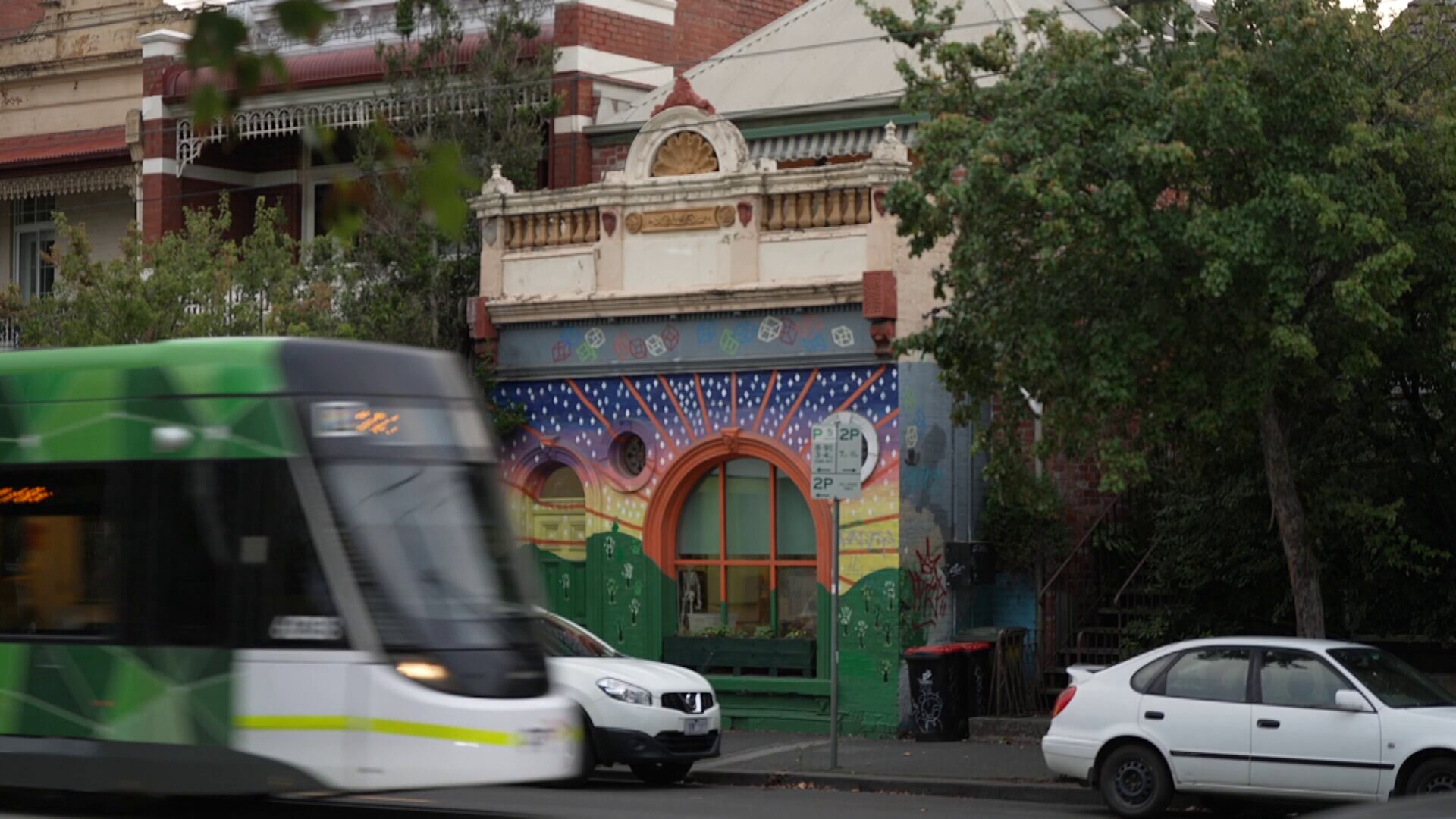 Tram passing school - ABC News