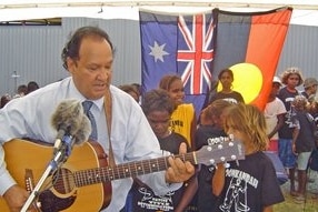 Ernie Bridge plays guitar