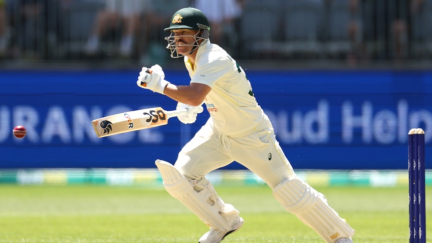 David Warner shapes to run on day one of the first Test against West Indies at Perth Stadium.
