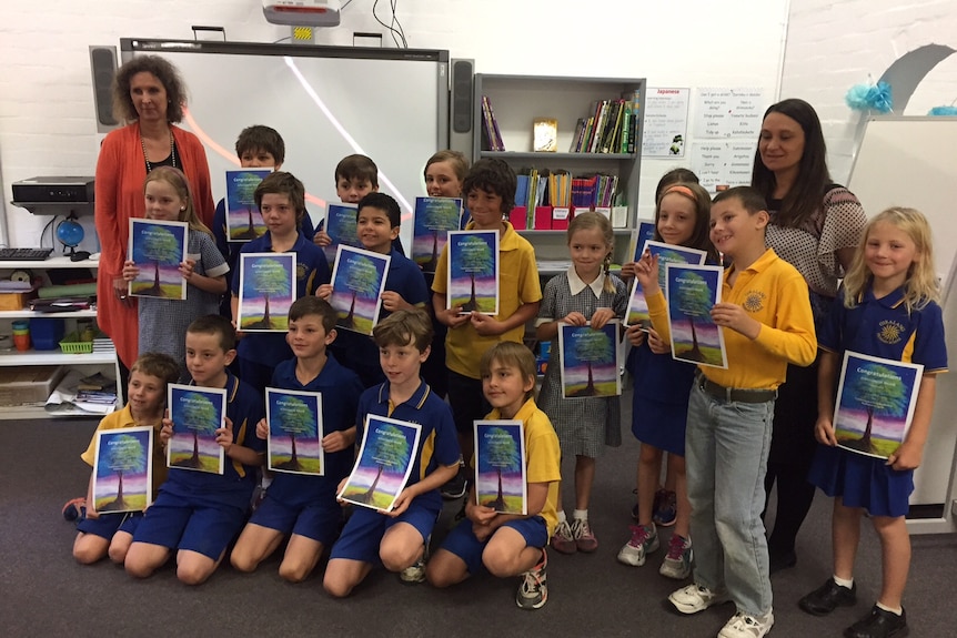 Year three students from Giralang Primary at the end of the school year, 17 December 2015