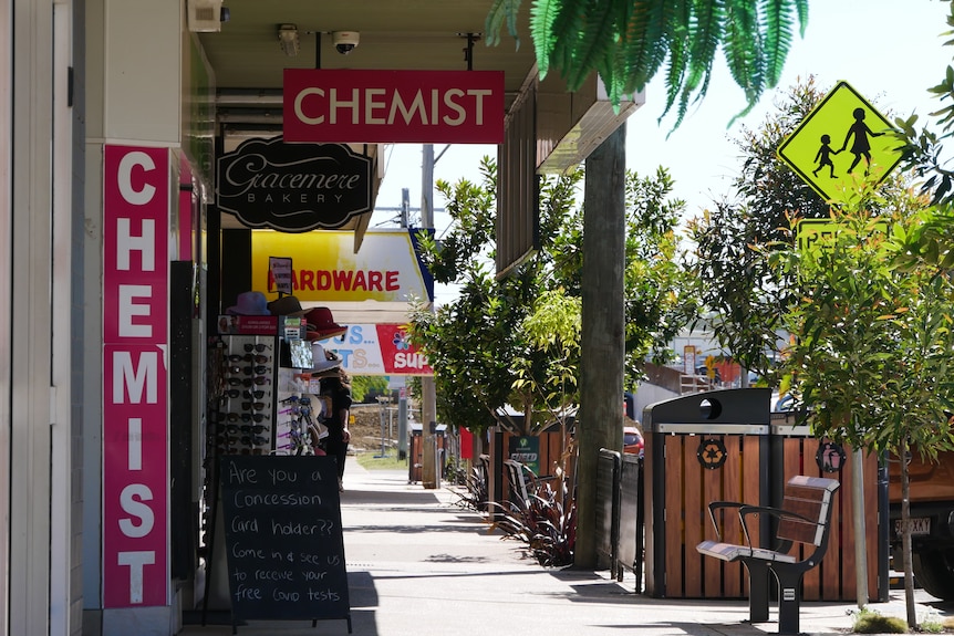 A chemist, bakery and hardware store in a small town's main street