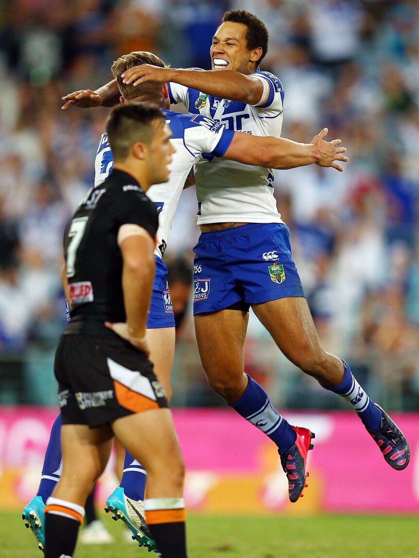 Moses Mbye celebrates golden point field goal against Tigers