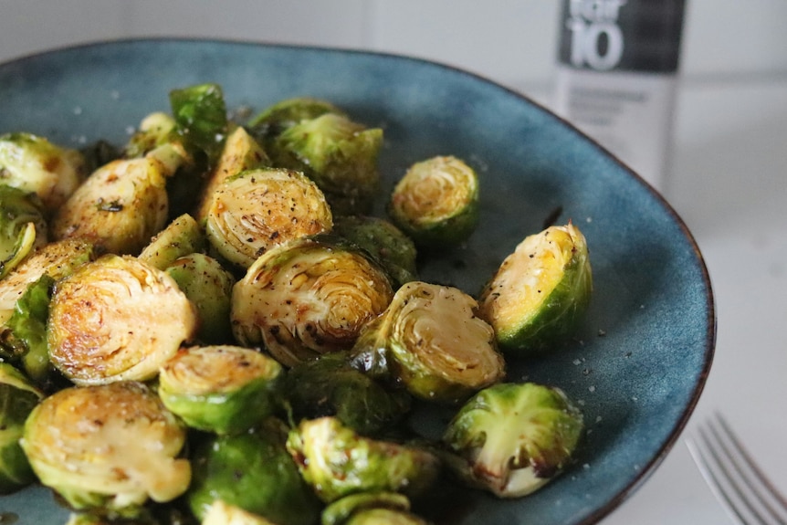 A plate of sautéed Brussels sprouts