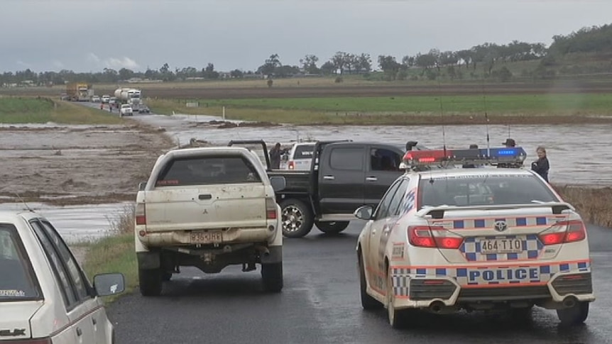 Floodwaters cut road on Qld's Darling Downs on March 30, 2014