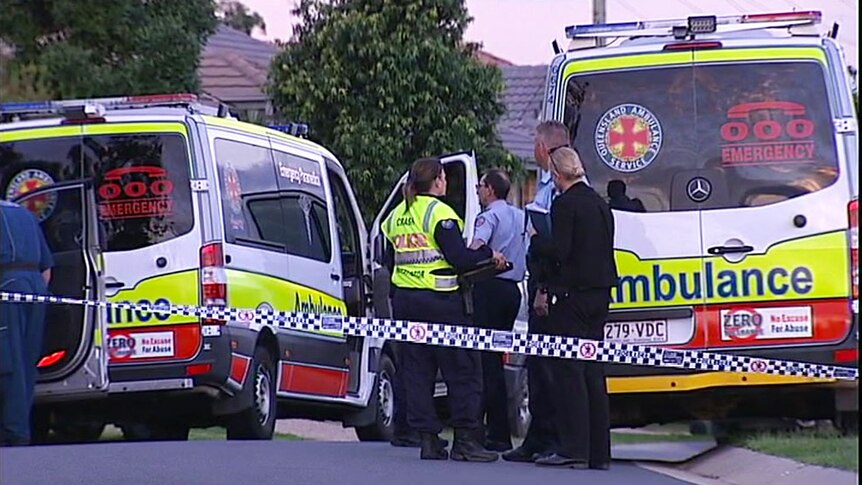 Emergency services and police at Aramac Street at Brassall where toddler killed in driveway incident