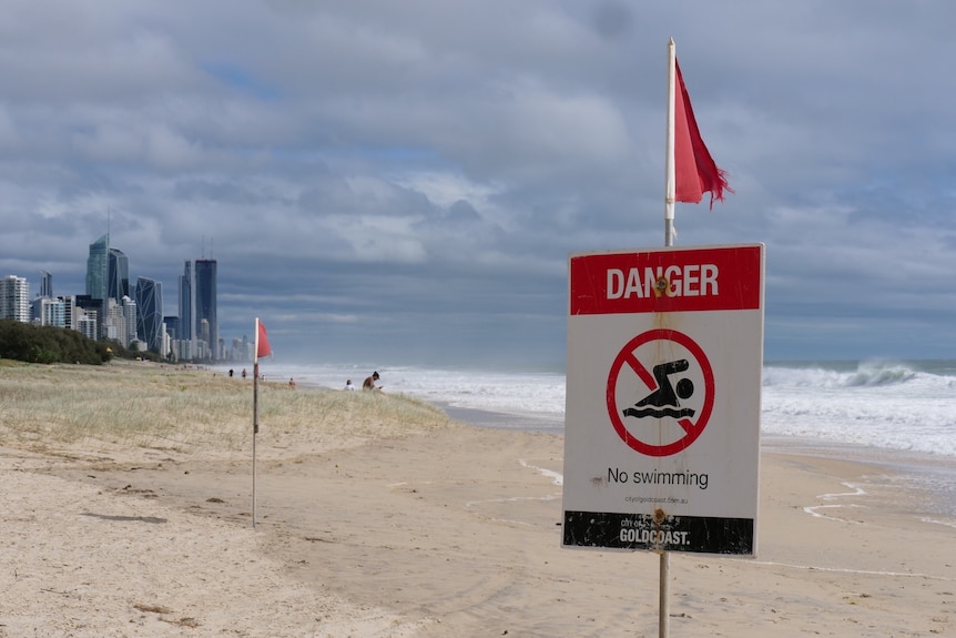 Danger sign at Mermaid Beach amid dangerous conditions as ex-Tropical Cyclone Seth sits offshore