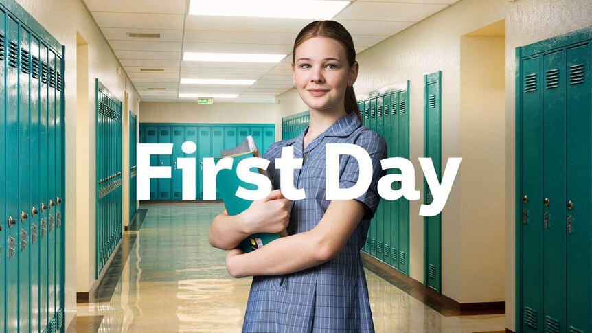 A teen girl in school uniform smiles while holding school books amongst lockers with the text First Day