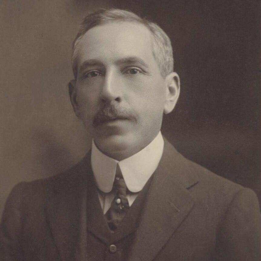 A black and white headshot of William Morris Hughes.