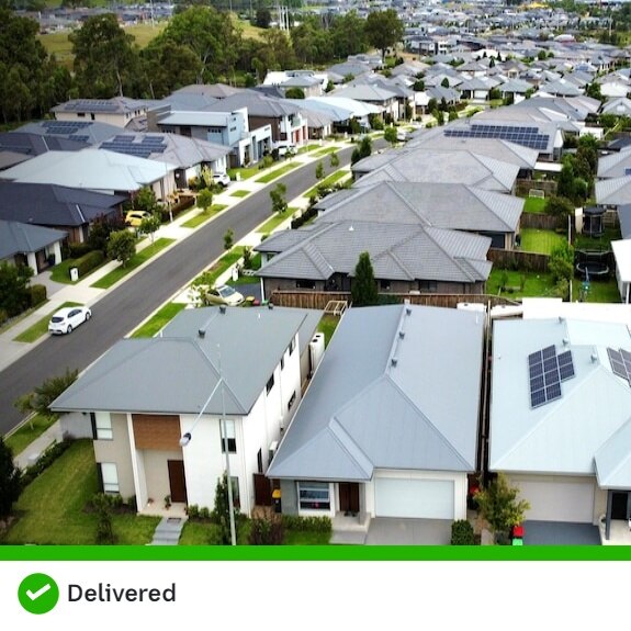 An aerial shot of rows of houses