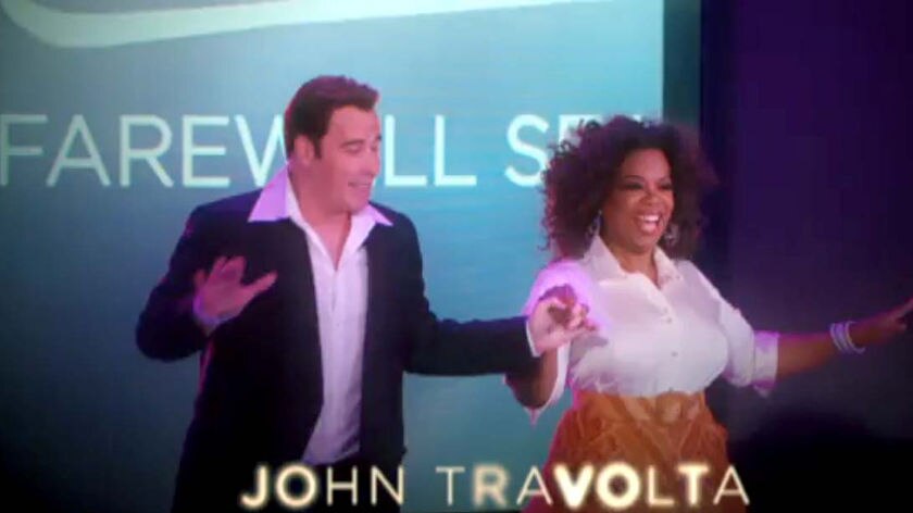 John Travolta helped Oprah Winfrey make the announcement.