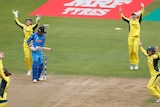 Australia's Alyssa Healy celebrates her catch to dismiss India's Smriti Mandhana at the Women's World Cup.