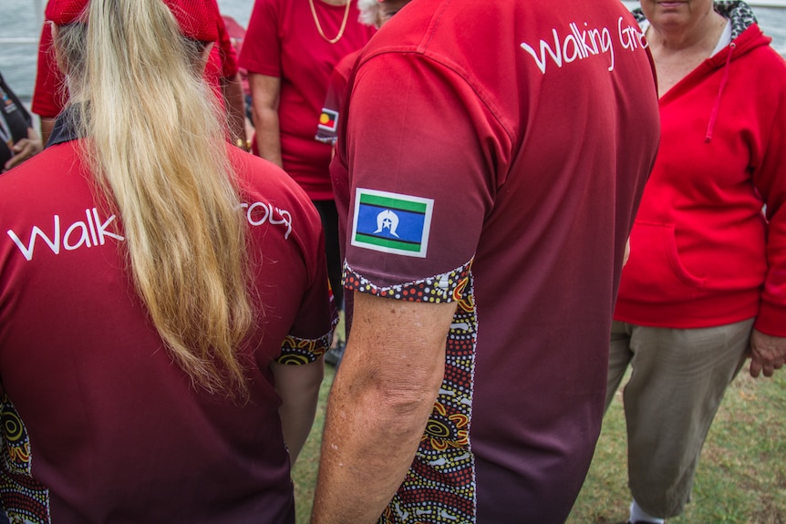 Torres Strait Islander flag on a walking t-shirt.