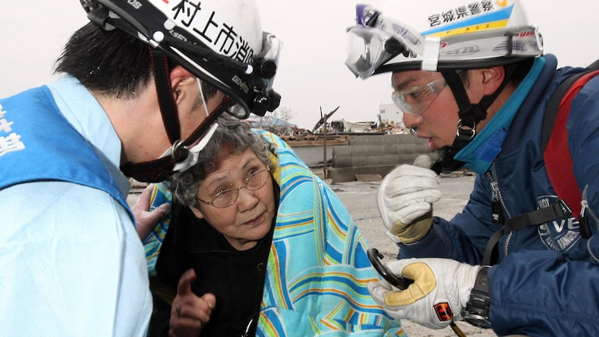 Quake survivor Sumi Abe pulled from rubble