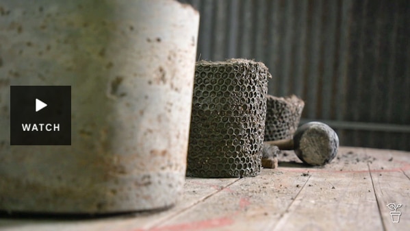 Cement pots sitting on a timber floor in a shed. Has Video.