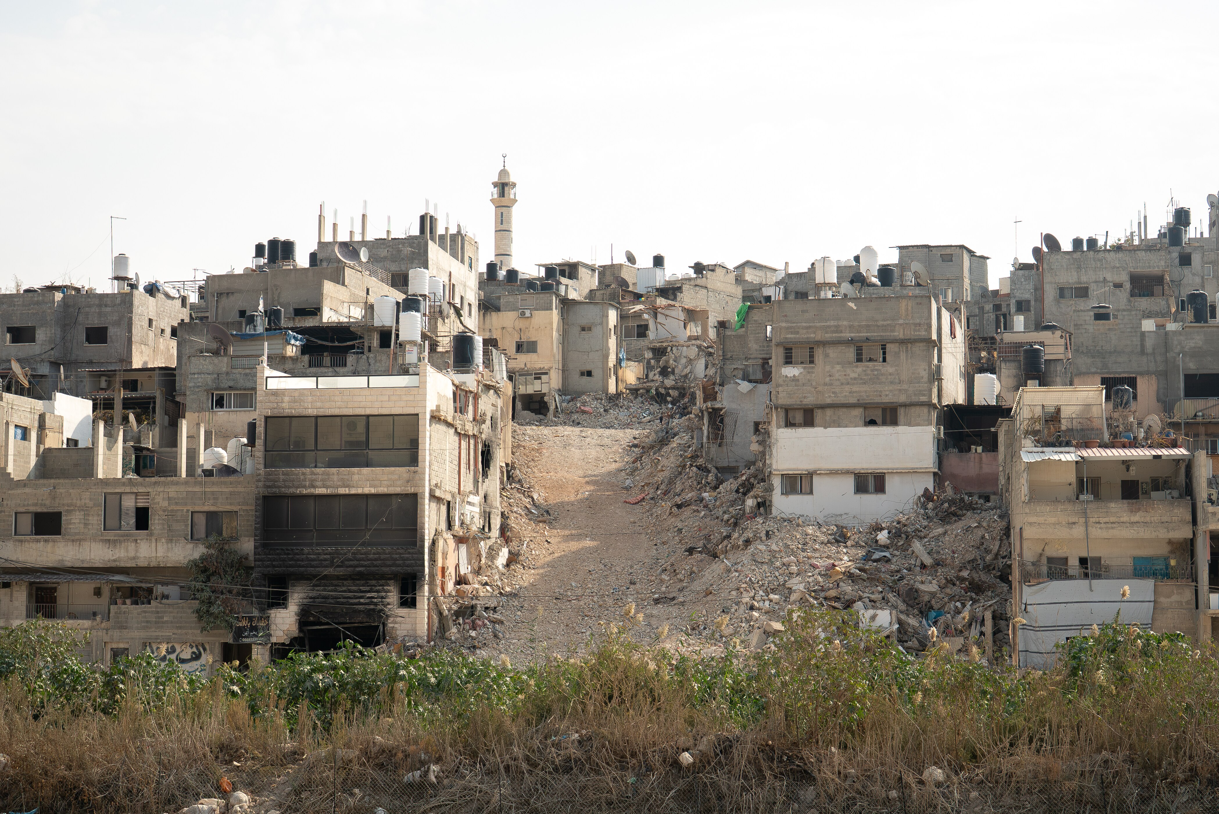 Buildings surrounded by rubble.
